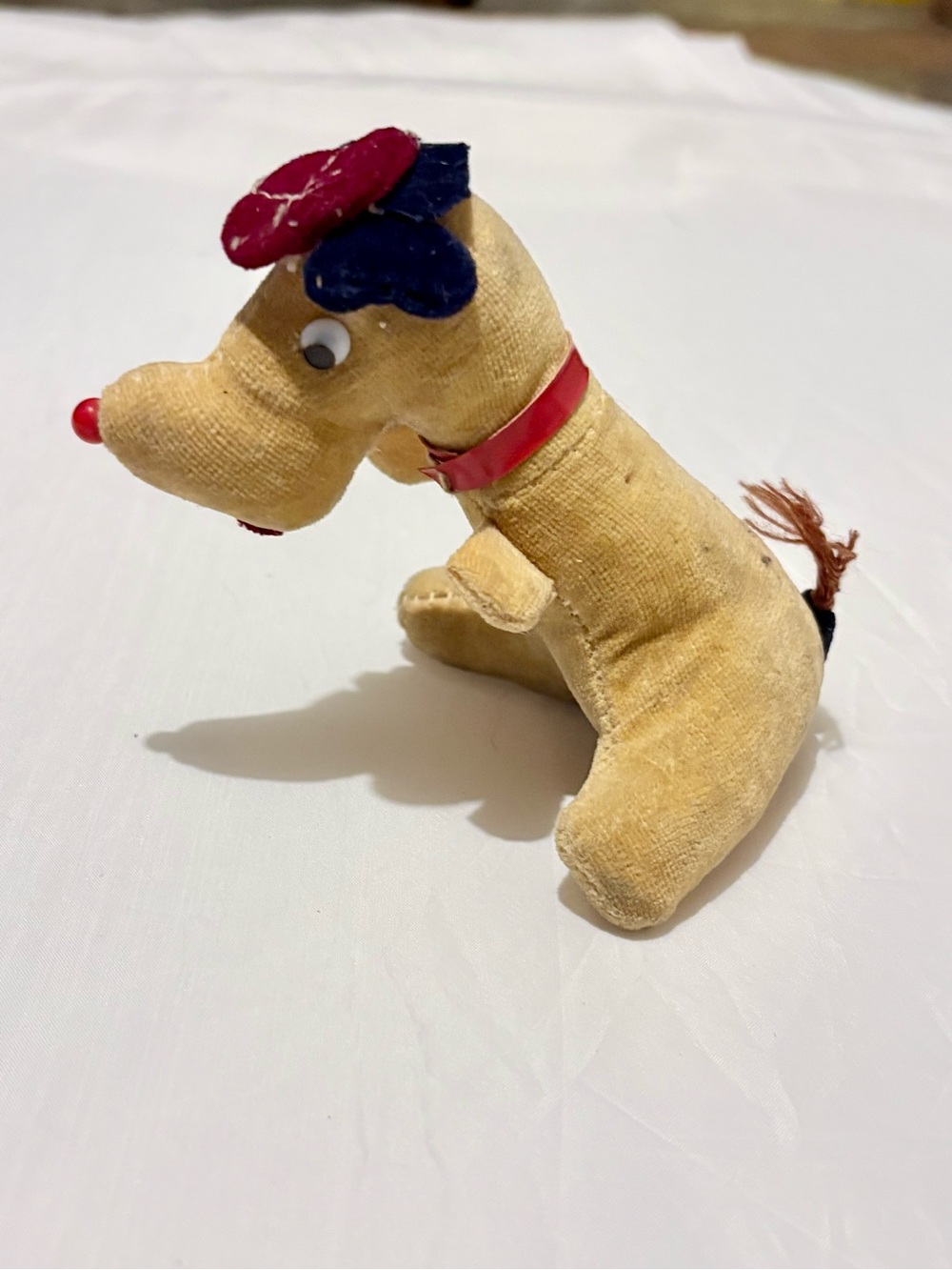 Antique Yellow Plush Dog Plush Tape Measure with Red Collar and Blue Accents